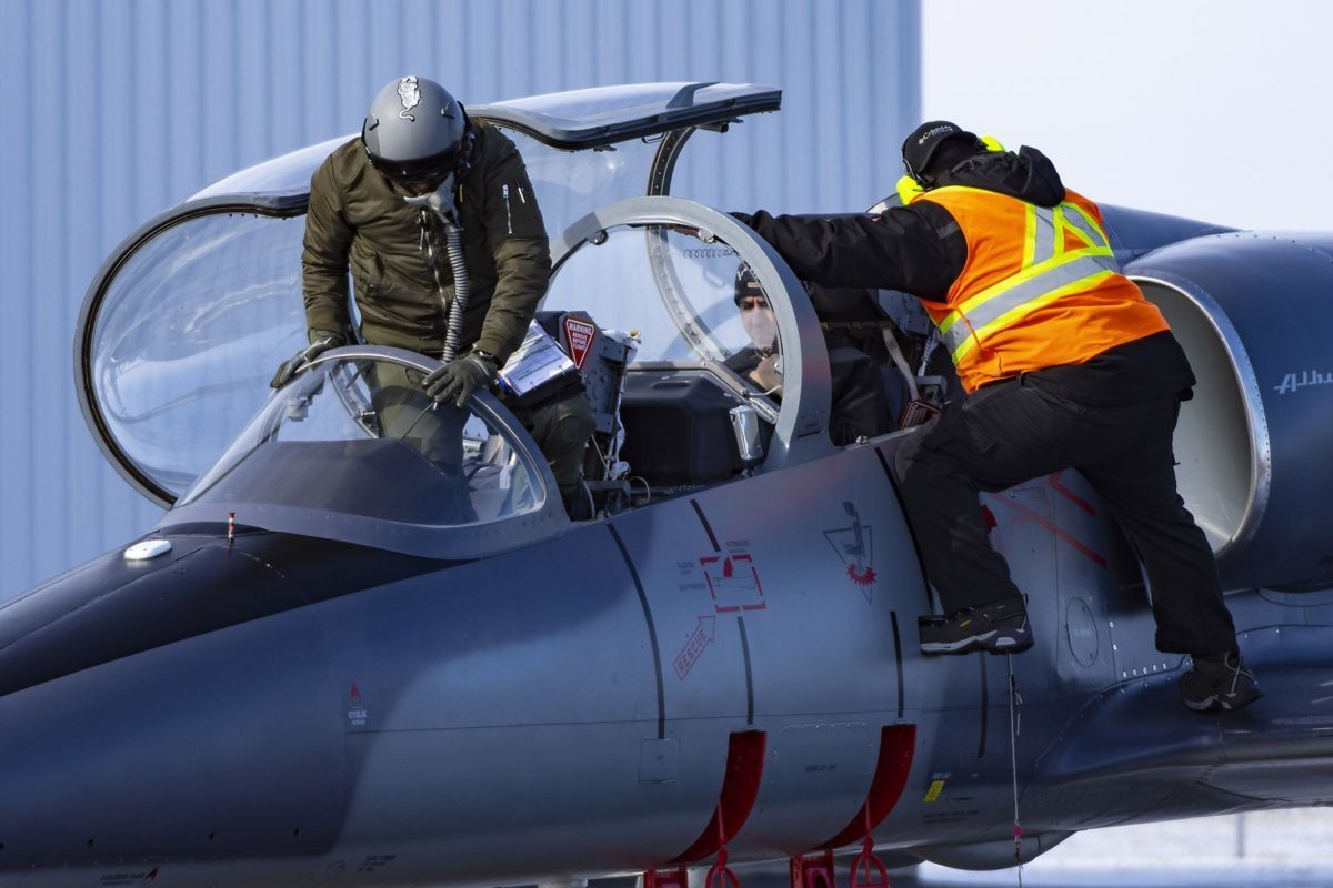 L39 boarding A male ITTC student boarding a grey L-39.