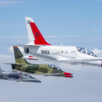 L-39s in formation Photo of three Aero Vodochody L39 aircraft in the sky.