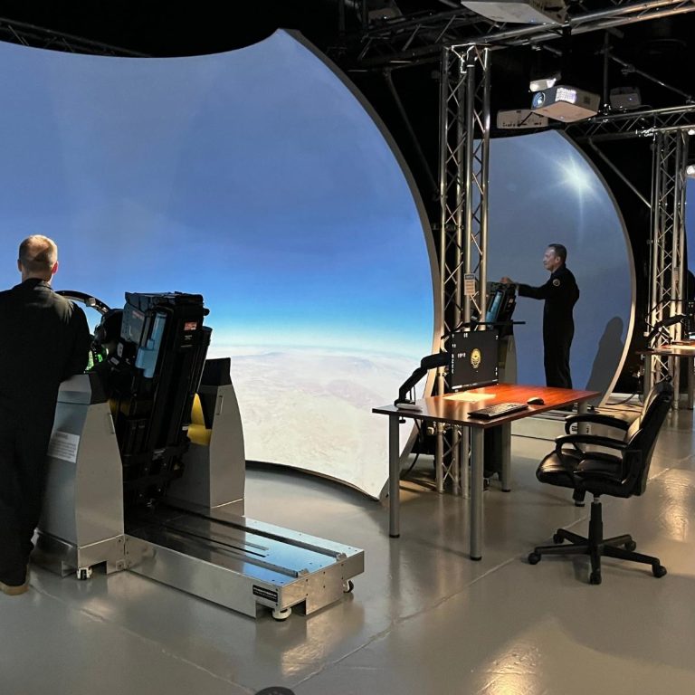 Instructors and students FWIC 2022 RMAF students and instructors in F/A-18 simulator