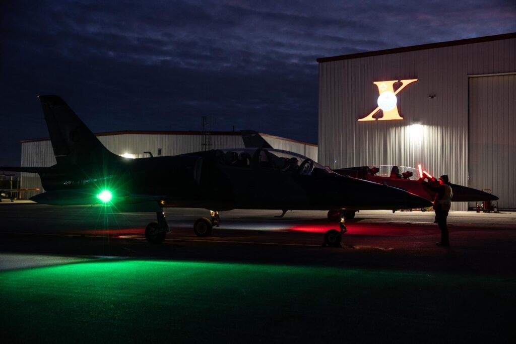 y (7) L39 on ramp at night