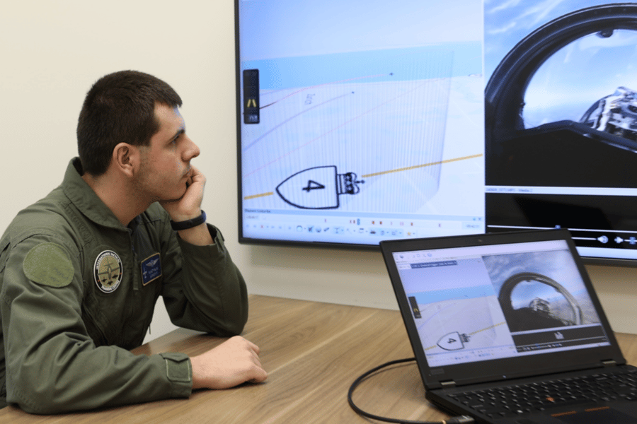 Student looking at screen during debriefing