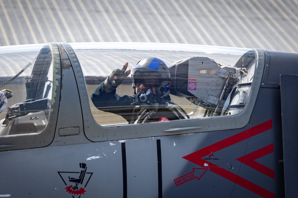 1783111563750 ITTC tactical instructor giving peace sign from L39 rear cockpit