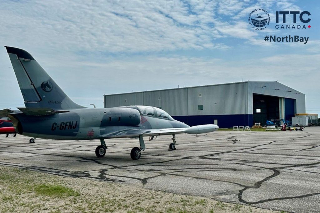 1783111563777 L39s parked on ITTC North Bay ramp with hangar in the background
