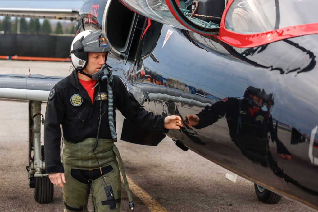 Brendan 'Darcee' Pierce, VP, Tactical training conducting pre-flight check on L39