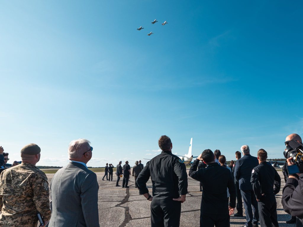 1789328074839 ITTC team and Ukraine visitors look to the sky of four ITTC jets in formation